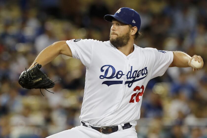 Dodgers ace Clayton Kershaw delivers a pitch against the Blue Jays in the third inning Tuesday night, Aug. 20, 2019, at Dodger Stadium in Los Angeles. (Luis Sinco/Los Angeles Times)