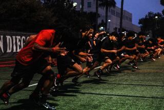 San Diego State football players were up before the sun Wednesday morning to begin conditioning workouts.