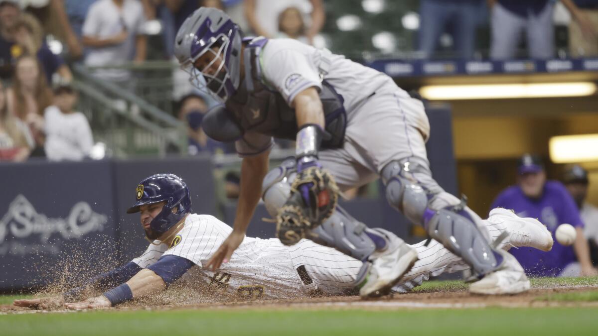 Padres open series with 6-5 win over Rockies at Coors Field