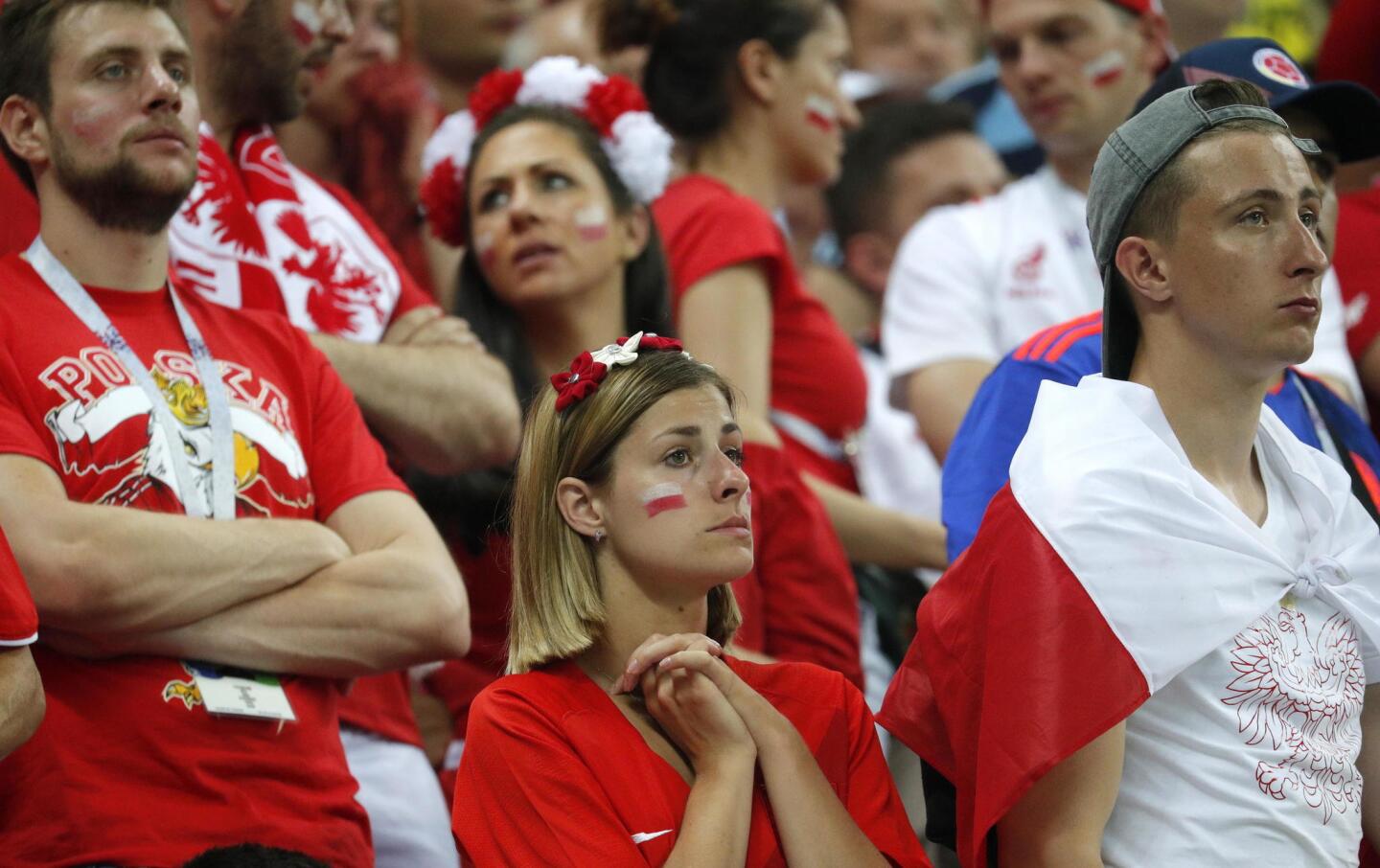 Supporters of Poland react after the FIFA World Cup 2018 group H preliminary round soccer match between Poland and Colombia in Kazan, Russia, 24 June 2018. Poland lost the match 0-3.