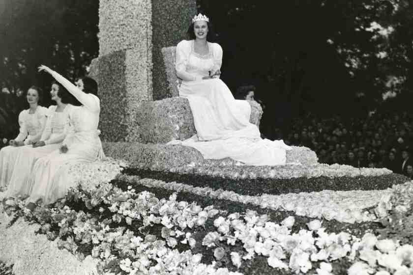 This photo provided by the Pasadena Tournament of Roses shows Margaret Huntley Main riding the parade float as the Rose Queen for the Pasadena Tournament of Roses in 1940. Margaret Huntley Main, the 1940 Tournament of Roses queen and the oldest living titleholder, died last Friday, Nov. 24, 2023, in Auburn, Calif., the Tournament of Roses said in a statement Tuesday, Nov. 28. She was 102. (Pasadena Tournament of Roses via AP)