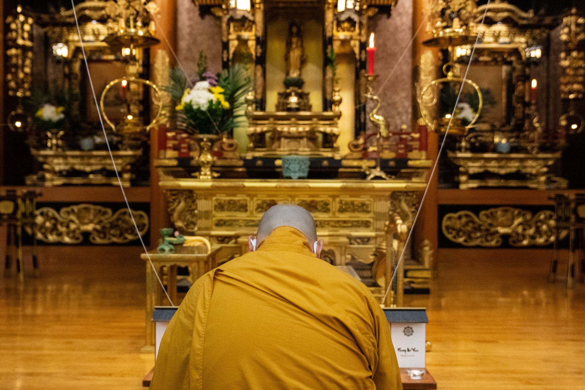 A Buddhist priest bows at Higashi Honganji Buddhist Temple