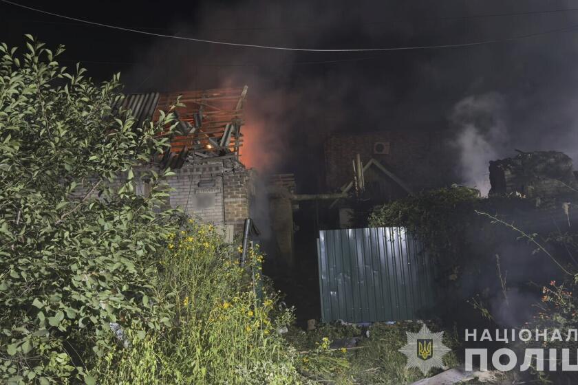 In this photo provided by the National Police of Ukraine on Tuesday, August 27, 2024, a residential house is seen on fire after Russian airstrike in Zaporizhzhia, Ukraine. (National Police of Ukraine via AP)