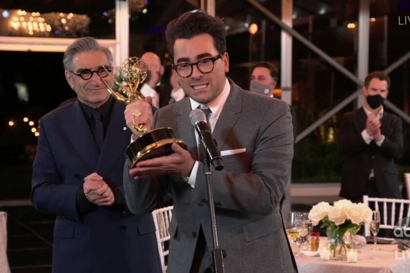 LOS ANGELES, CA: Dan and Eugene Levy after winning Outstanding Comedy Series for "Schitt's Creek" pictured in a screengrab from the telecast of the 72nd Annual Emmy Awards on ABC hosted by Jimmy Kimmel on September 20, 2020. CREDIT: ABC/ Walt Disney Television