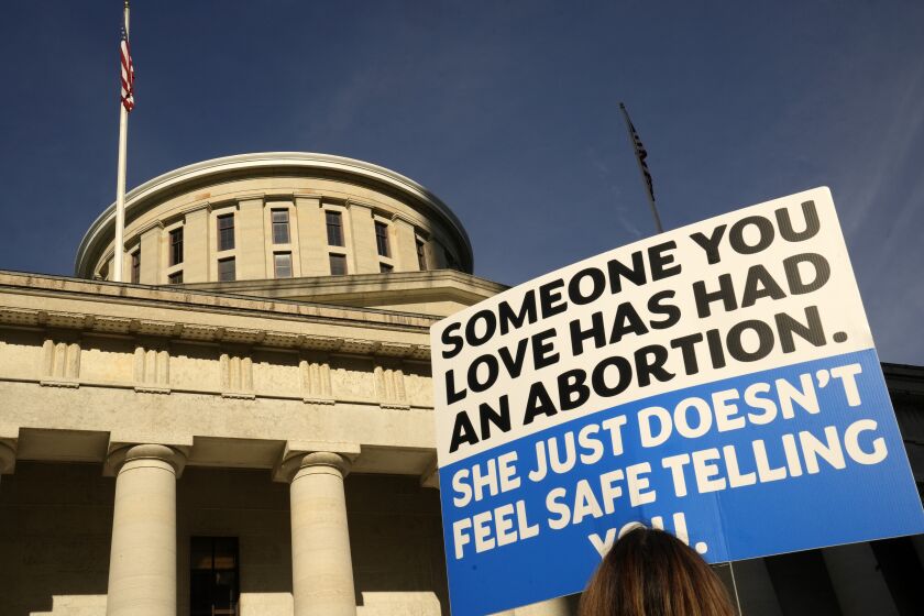 FILE - Protesters rally at the Ohio Statehouse in support of abortion after the Supreme Court overturned Roe vs. Wade, June 24, 2022 in Columbus, Ohio. The Ohio Supreme Court agreed Tuesday, March 14, 2023, to review a county judge’s order that is blocking enforcement of the state's near-ban on abortions, and to consider whether the clinics challenging the law have legal standing to do so. In its split decision, the court, however, denied Republican Attorney General Dave Yost's request to launch its own review of the right to an abortion under the Ohio Constitution, leaving those arguments to play out in lower court. (Barbara J. Perenic/The Columbus Dispatch via AP, File0
