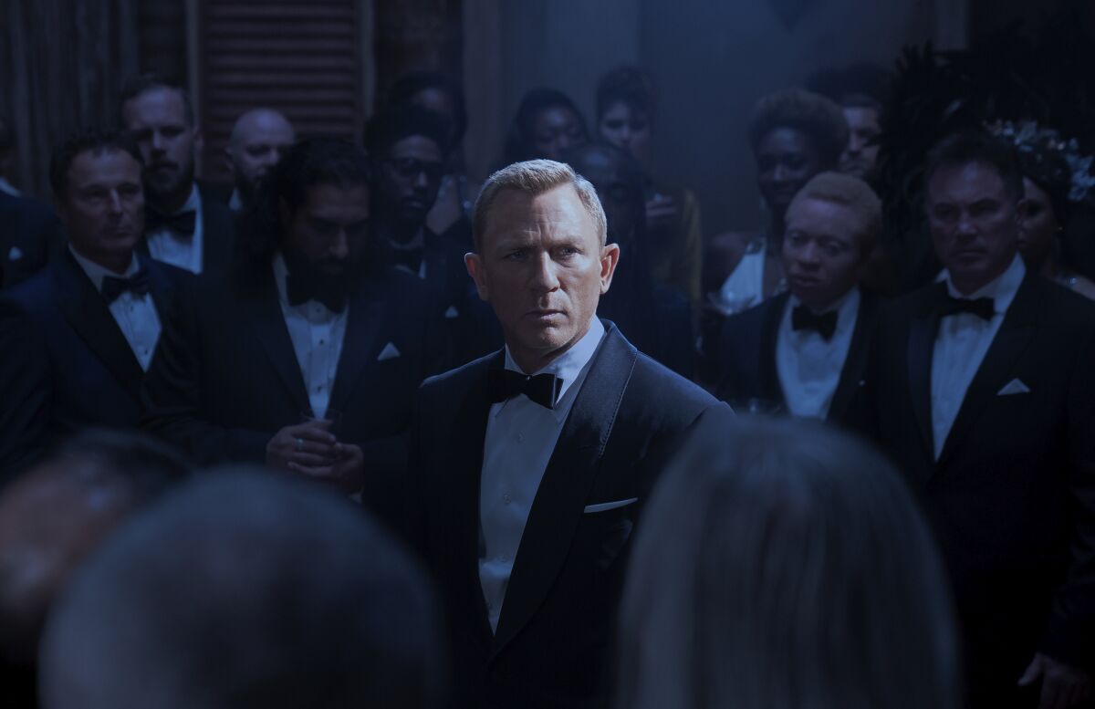 This image released by Metro Goldwyn Mayer Pictures shows Daniel Craig in a scene from "No Time To Die." (Nicola Dove/Metro Goldwyn Mayer Pictures via AP)