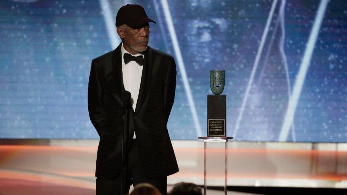 Morgan Freeman receives the lifetime achievement award during the show at the 24th Screen Actors Guild Awards at the Los Angeles Shrine Auditorium on Jan. 21.