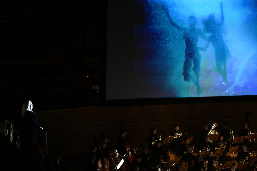 Los Angeles, California December 10, 2022-Brangane (Okka von Der Damerau) sings during Act 1 off the L.A. Phil Tristan Project at Disney Hall Friday. (Wally Skalij/Los Angeles Times)