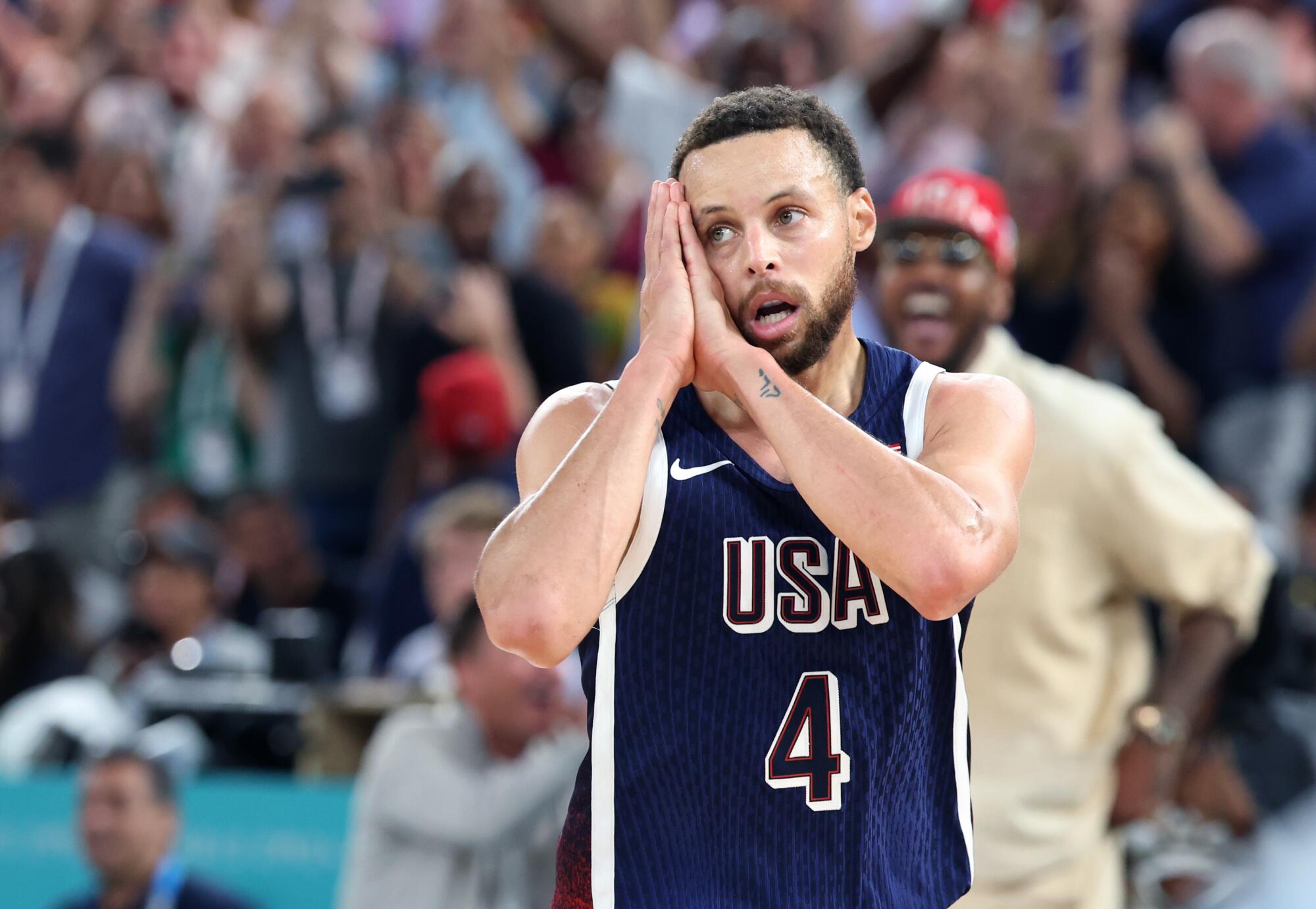 USA's Stephen Curry gestures after a three-pointer against France in the gold medal match.