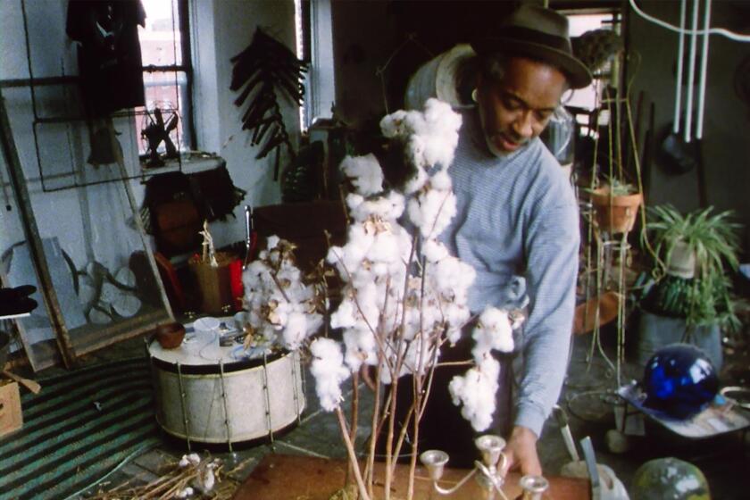 David Hammons at work in his Harlem studio in the 1980s