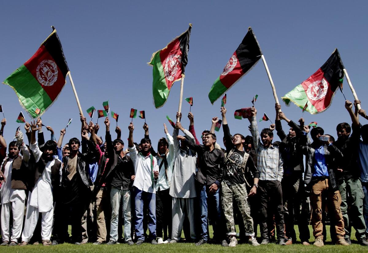 Afghan protesters chant slogans against Pakistan during a demonstration on the outskirts of Kabul.