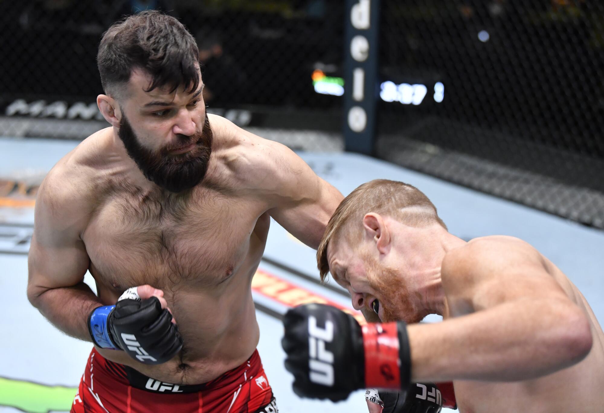 LAS VEGAS, NEVADA - APRIL 10: (L-R) Julian Marquez punches Sam Alvey.