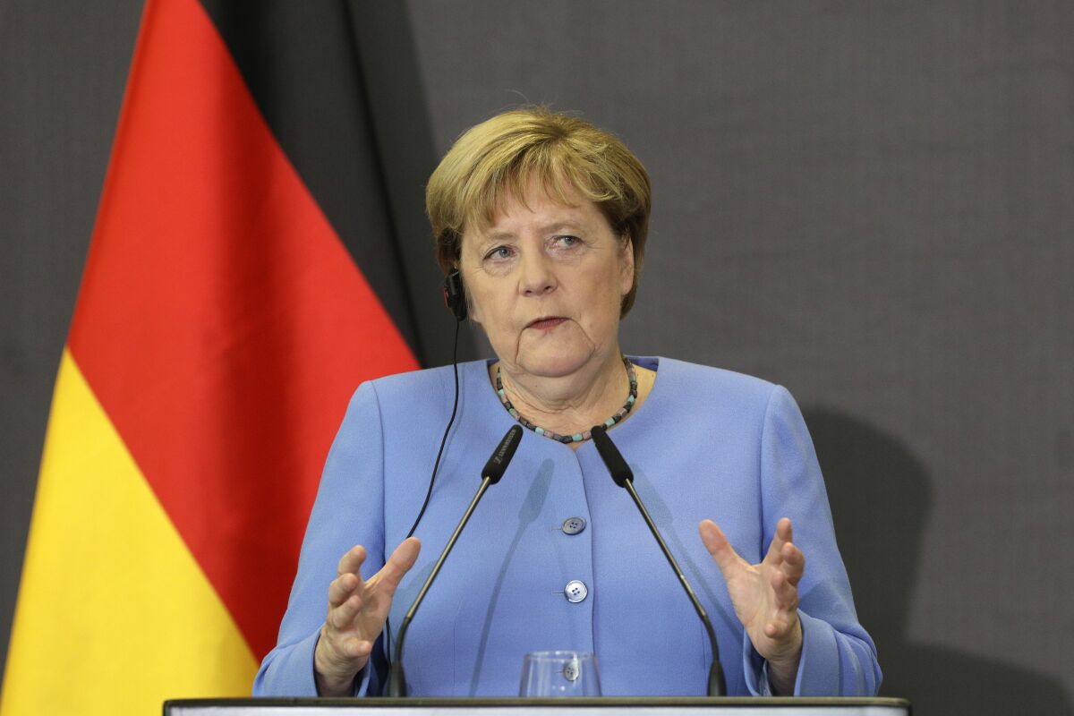 German Chancellor Angela Merkel speaks during a news conference with the Albanian Prime Minister Edi Rama in Tirana, Albania, Tuesday, Sept. 14, 2021. Merkel is on a farewell tour of the Western Balkans, as she announced in 2018 that she wouldn't seek a fifth term as Germany's Chancellor. (AP Photo/Franc Zhurda)