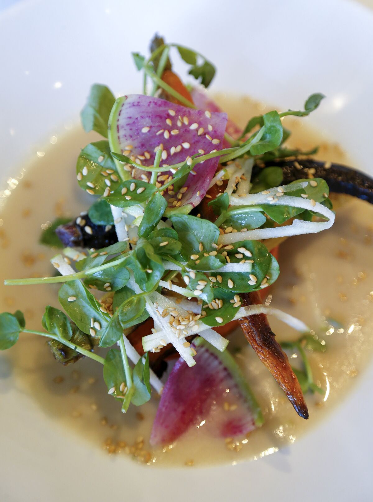 Verdant's roasted sweet potato with lemongrass coconut milk and watermelon radish.