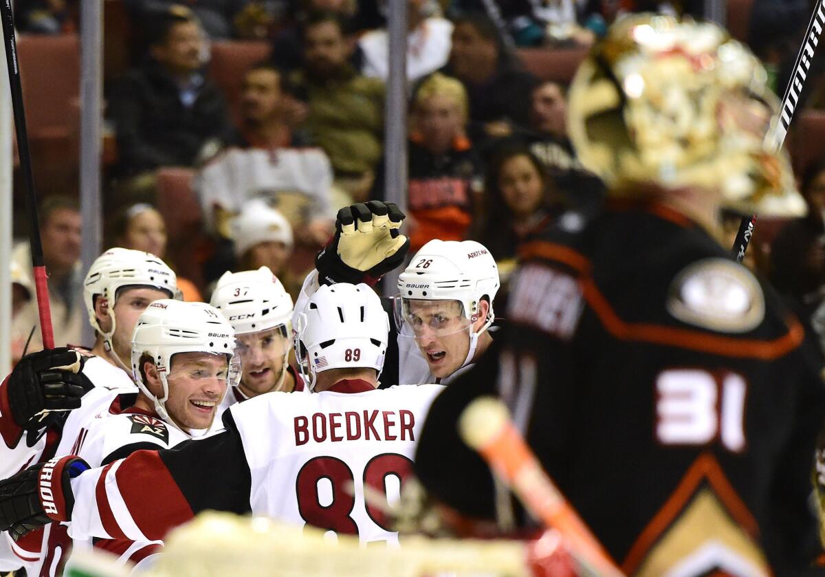 Coyotes forward Max Domi celebrates after scoring on Ducks goalie Frederik Andersen during the second period Nov. 9 at Honda Center.