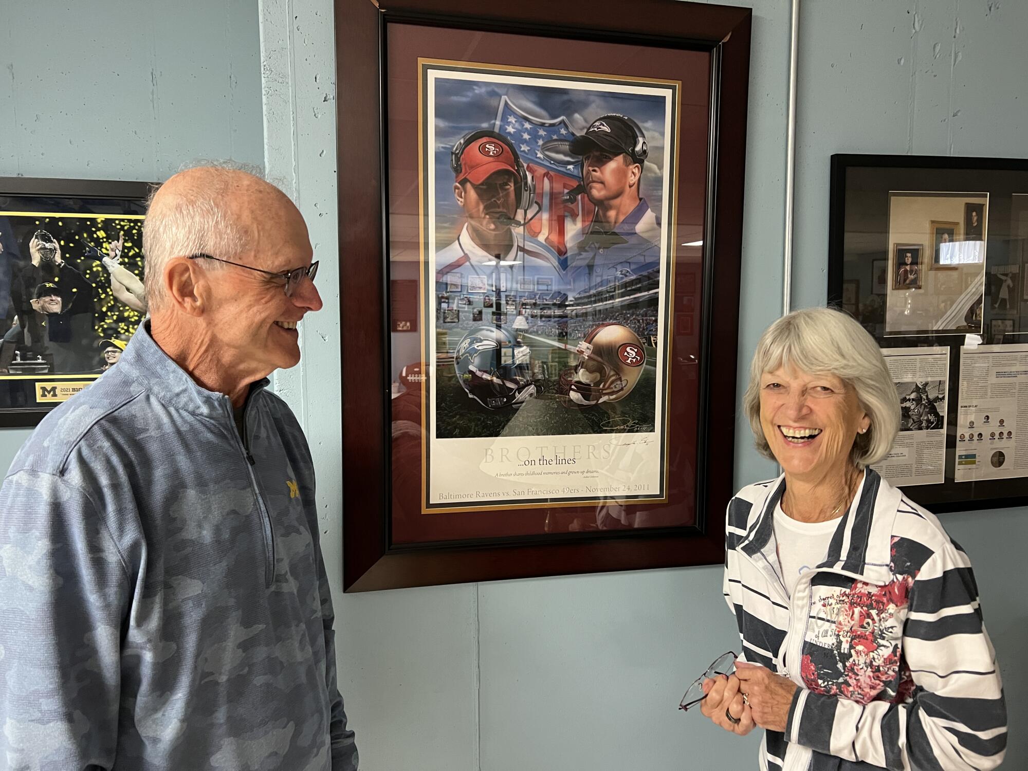 Jack, left, and Jackie Harbaugh smile while taking about their sons.