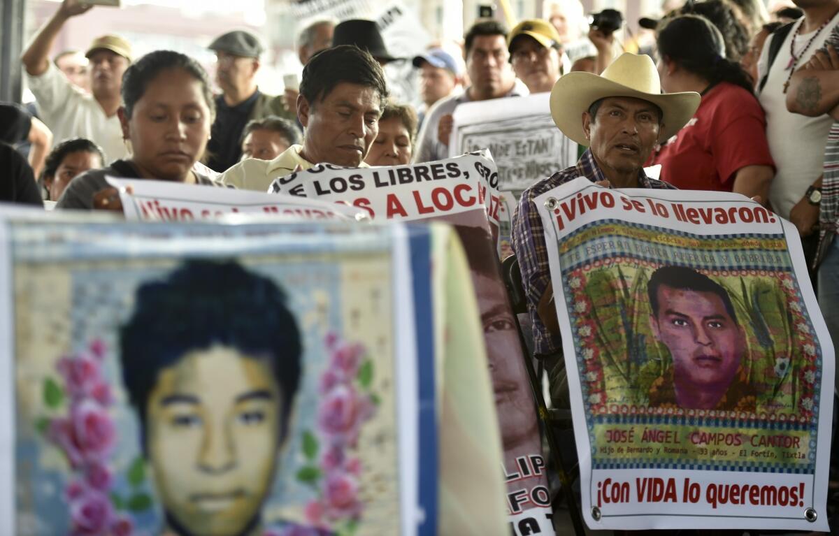 Relatives of the 43 missing students from a rural teachers college in Mexico attend a press conference in Mexico City.