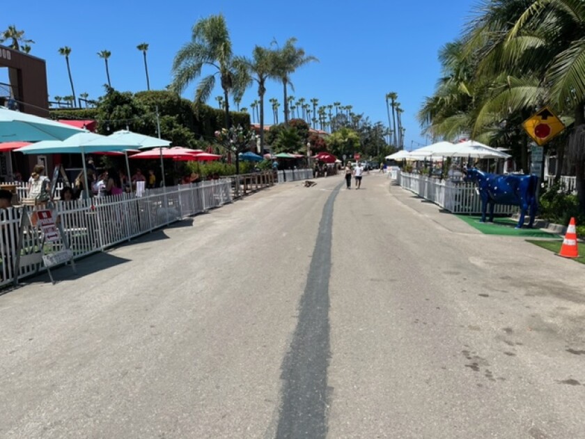 Many restaurants along Avenida de la Playa must adjust their outdoor dining spaces according to their new outdoor permit.