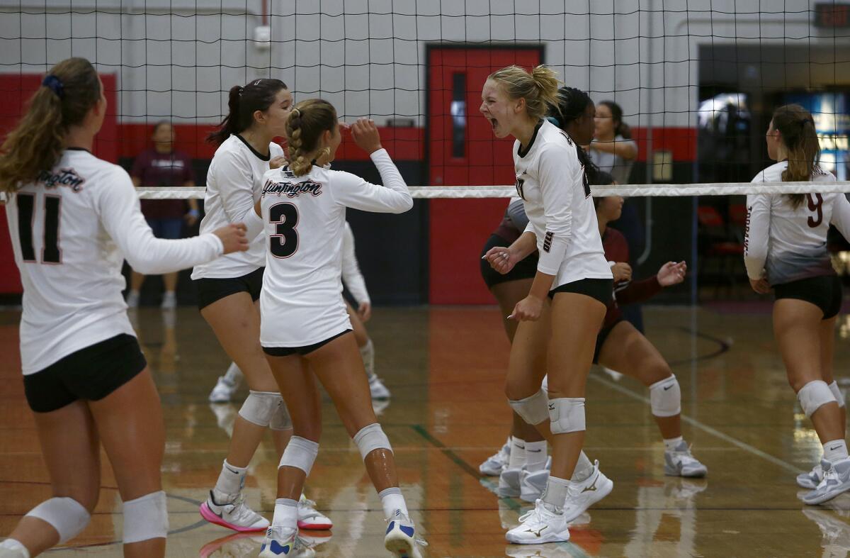 Huntington Beach's Taylor Ponchak, right, reacts after giving the Oilers a 24-21 lead against Torrance.  