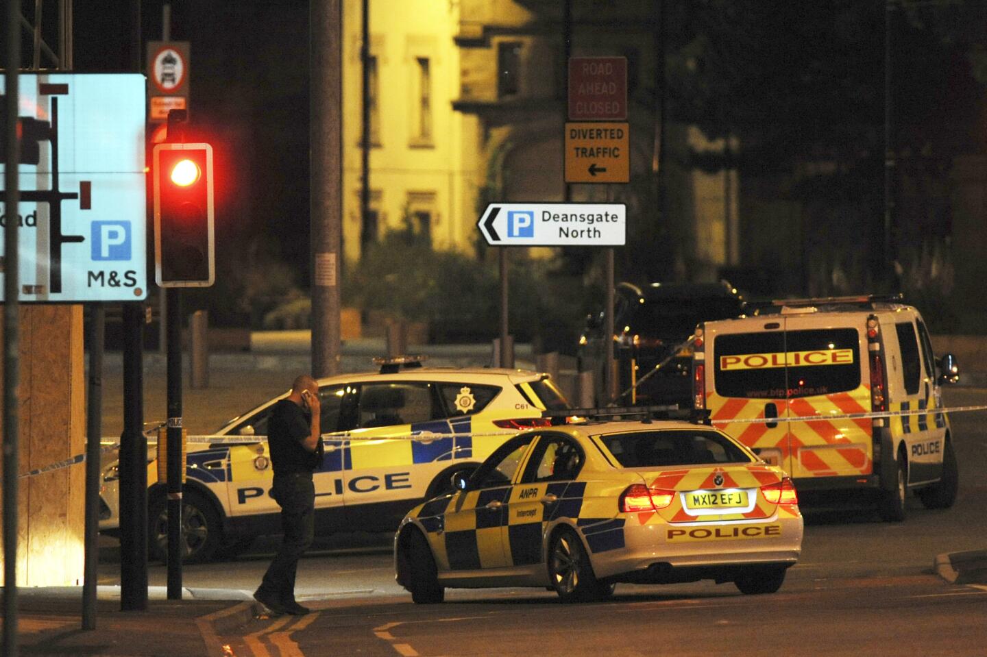 Police block a road to Manchester Arena after the explosion.