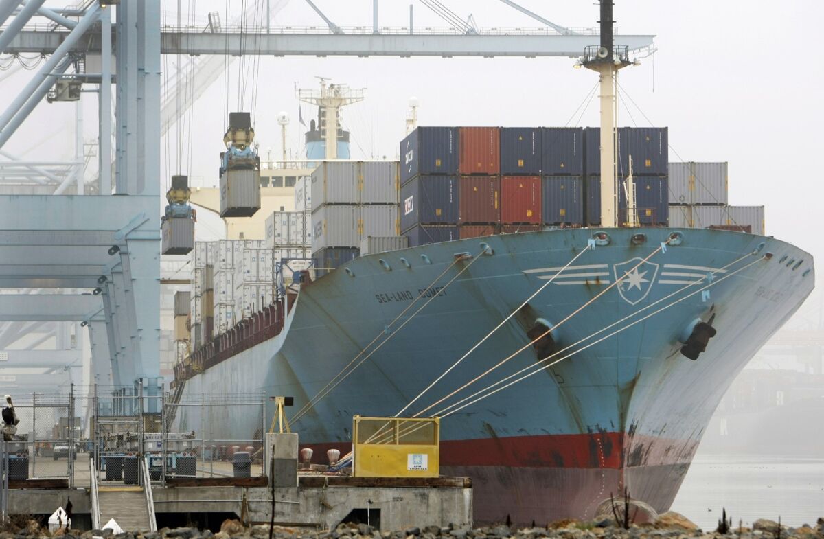 A container ship is off-loaded at the Port of Los Angeles.