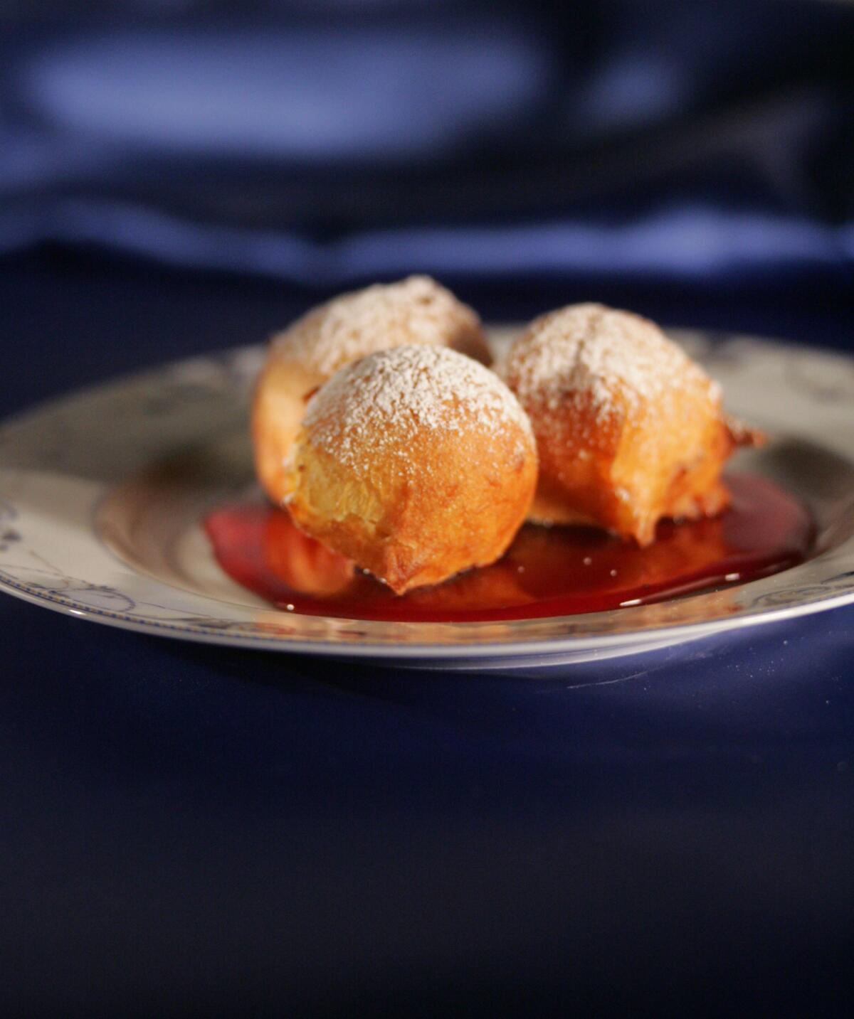 Bumuelos in Red Wine Sauce