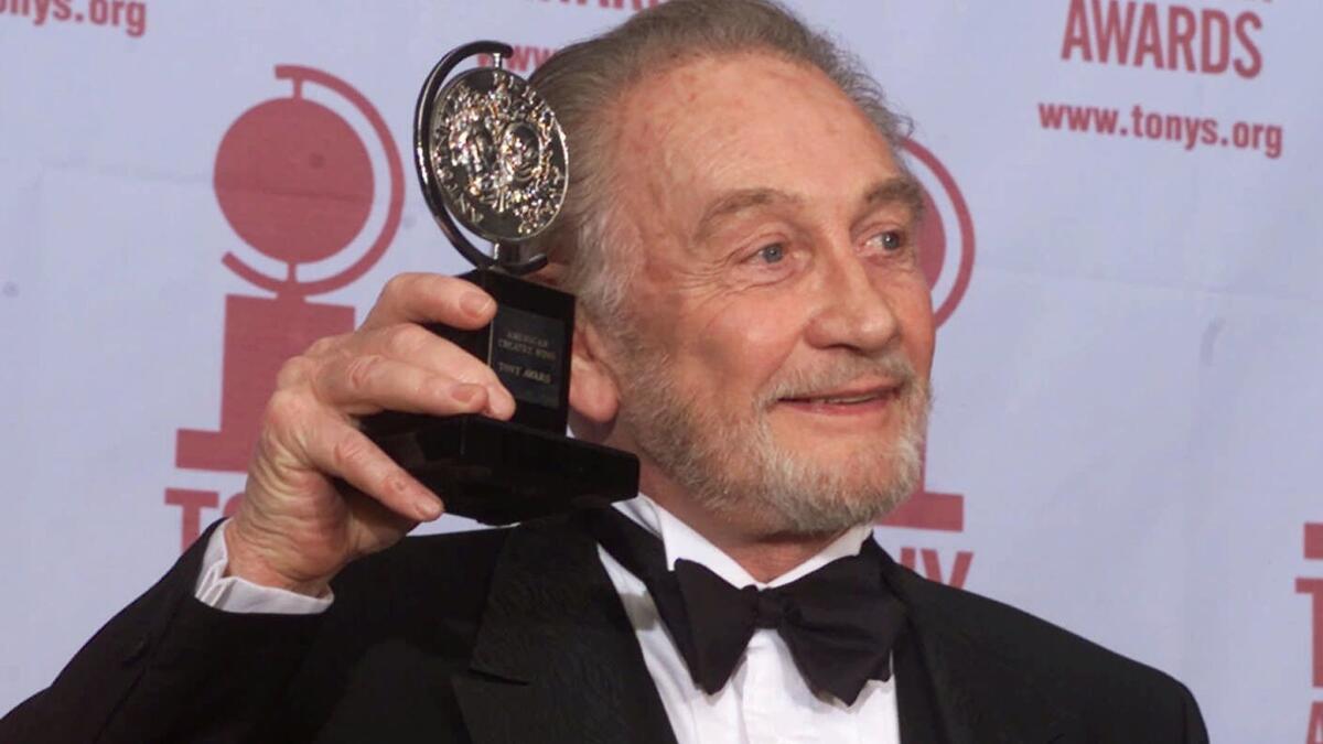 Roy Dotrice poses with his Tony Award in 2000.