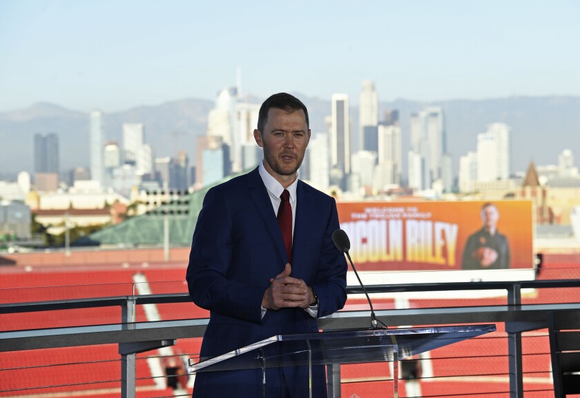 New USC football head coach Lincoln Riley speaks after being introduced during a news conference at the Los Angeles Coliseum.