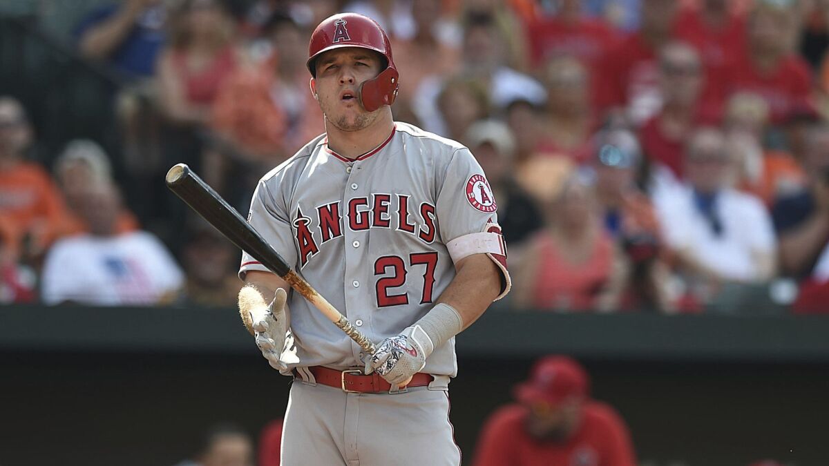 Mike Trout reacts at bat against the Baltimore Orioles in Baltimore on Saturday.