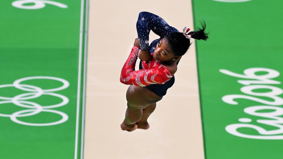U.S. gymnast Simone Biles competes on the vault during a qualification round Sunday.