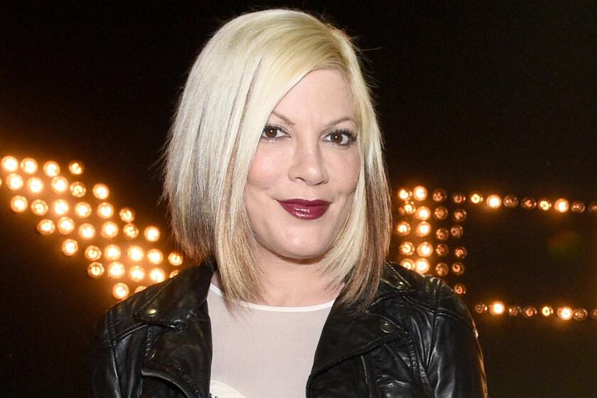 Tori Spelling burned her arm badly in an accident at a Benihana restaurant on Easter Sunday.
