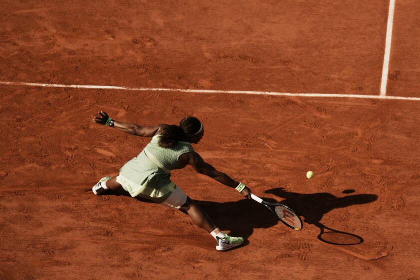 United States Serena Williams plays a return to Kazakhstan's Elena Rybakina during their fourth round match on day 8, of the French Open tennis tournament at Roland Garros in Paris, France, Sunday, June 6, 2021. (AP Photo/Thibault Camus)