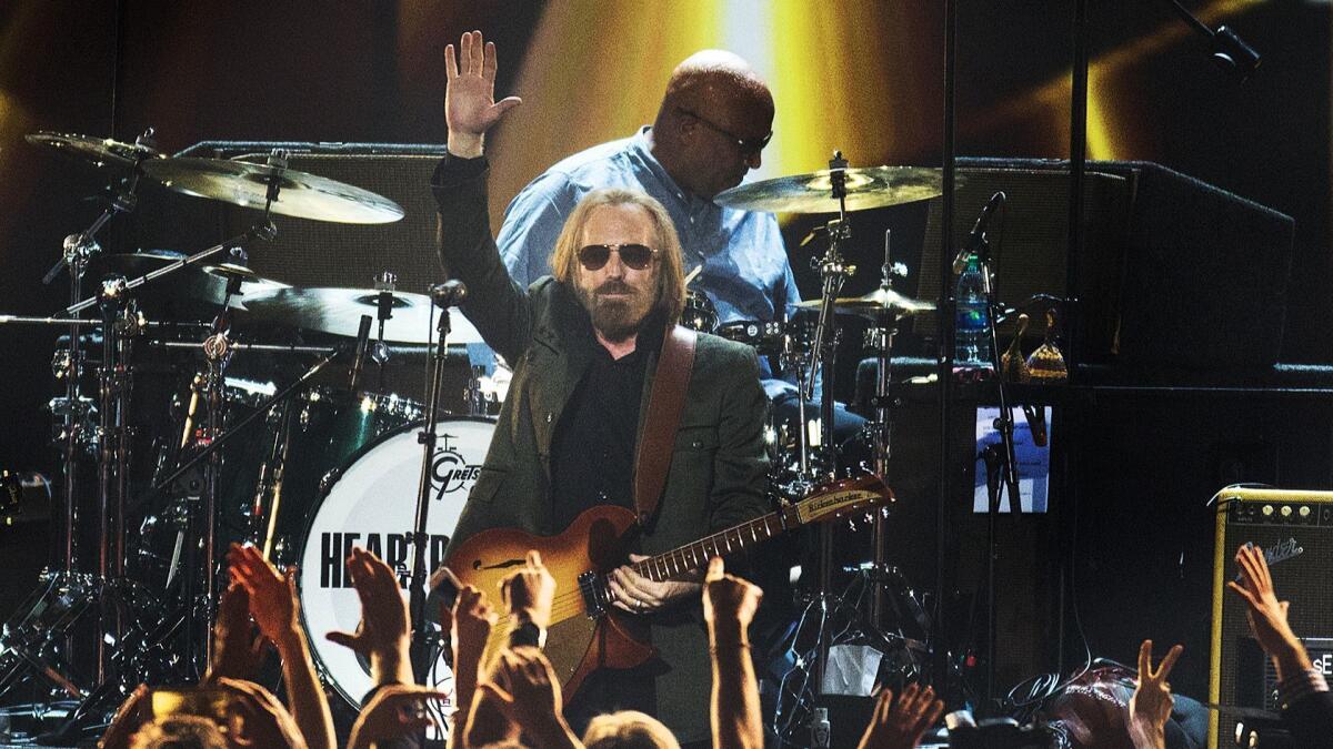 Tom Petty performs as the honoree of the Recording Academy's MusiCares Person of the Year at the Los Angeles Convention Center on Feb. 10. Just a few months later, in October, the rock 'n' roller died at age 66. https://lat.ms/2kV18Fo