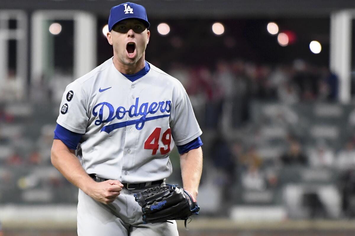 Dodgers reliever Blake Treinen reacts during the 2021 playoffs against the Atlanta Braves. 