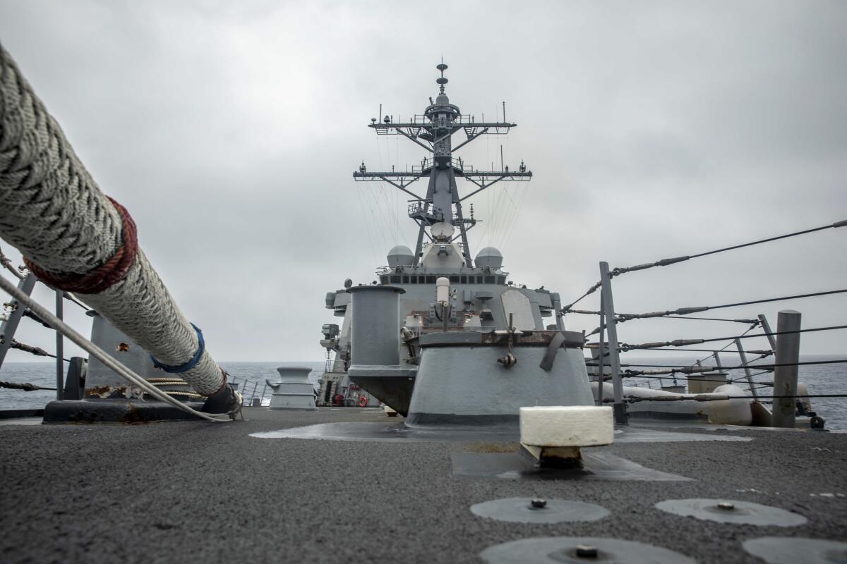 In this photo released by the U.S. Navy, the U.S. Arleigh Burke-class guided-missile destroyer USS Curtis Wilbur (DDG 54) conducts routine operations in the Taiwan Strait, May 18, 2021. China on Thursday, May 20, 2021, issued its second protest in as many days over United States naval activity in the region, drawing an unusually sharp response from the U.S. 7th Fleet, which accused Beijing of attempting to assert illegitimate maritime rights at the expense of its neighbors. (Mass Communication Specialist 3rd Class Zenaida Roth, U.S. Navy via AP)