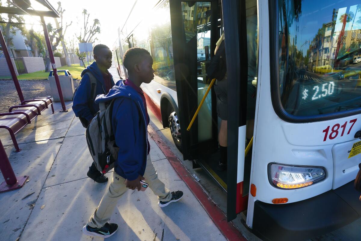 Asukulu Amisi and his twin brother, Mmunga Amisi, begin their nearly two-hour-long trip to Preuss Charter School.