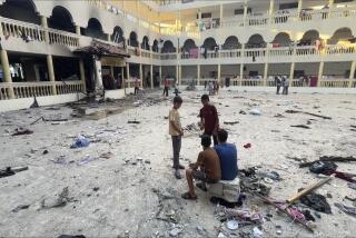 This image made from a video, shows the yard of a school after being hit by an Israeli airstrike in Gaza City Saturday, Aug. 10, 2024. (AP Photo)