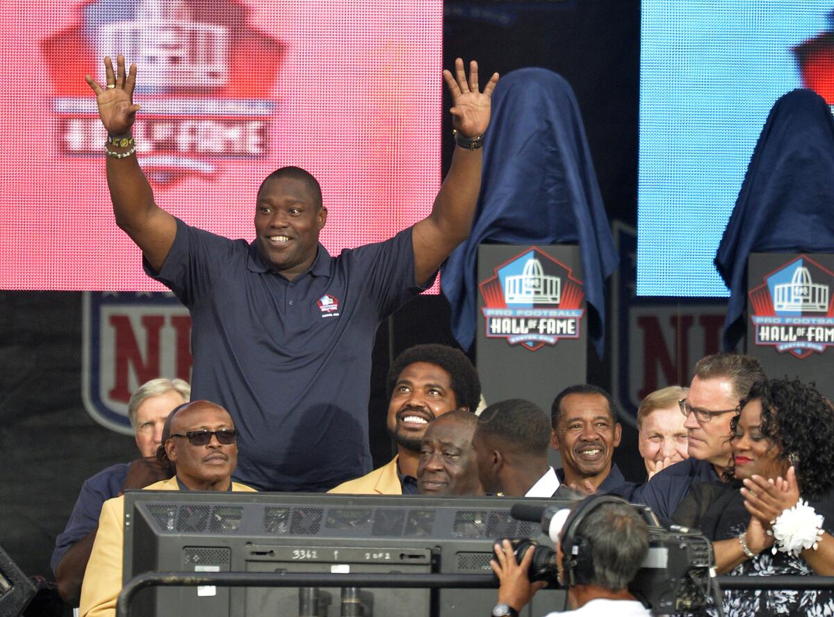 Warren Sapp has invested in and accepted a position at Santa Monica-based daily fantasy-sports start-up Rivalry Games. Above, Sapp is introduced this month at a Pro Football Hall of Fame induction ceremony in Canton, Ohio.