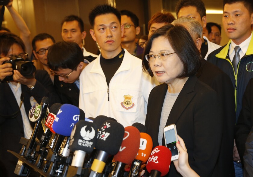 Taiwan's opposition Democratic Progressive Party, DPP, 2016 presidential candidate Tsai Ing-wen speaks to media before attending the Taiwan Econimic Development Forum in Taipei, Taiwan, Tuesday, Dec. 22, 2015.