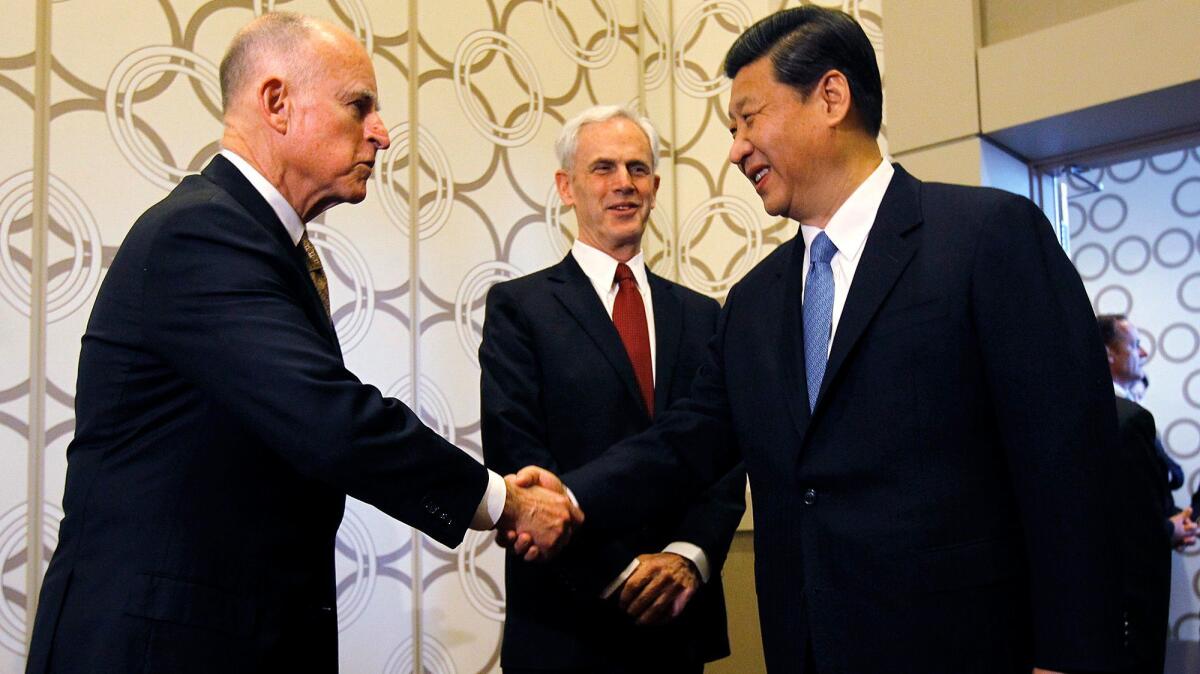 Then-Chinese Vice President China Vice President Xi Jinping and Gov. Jerry Brown greet each other in Los Angeles in 2012. President Xi and Brown met in China this week.