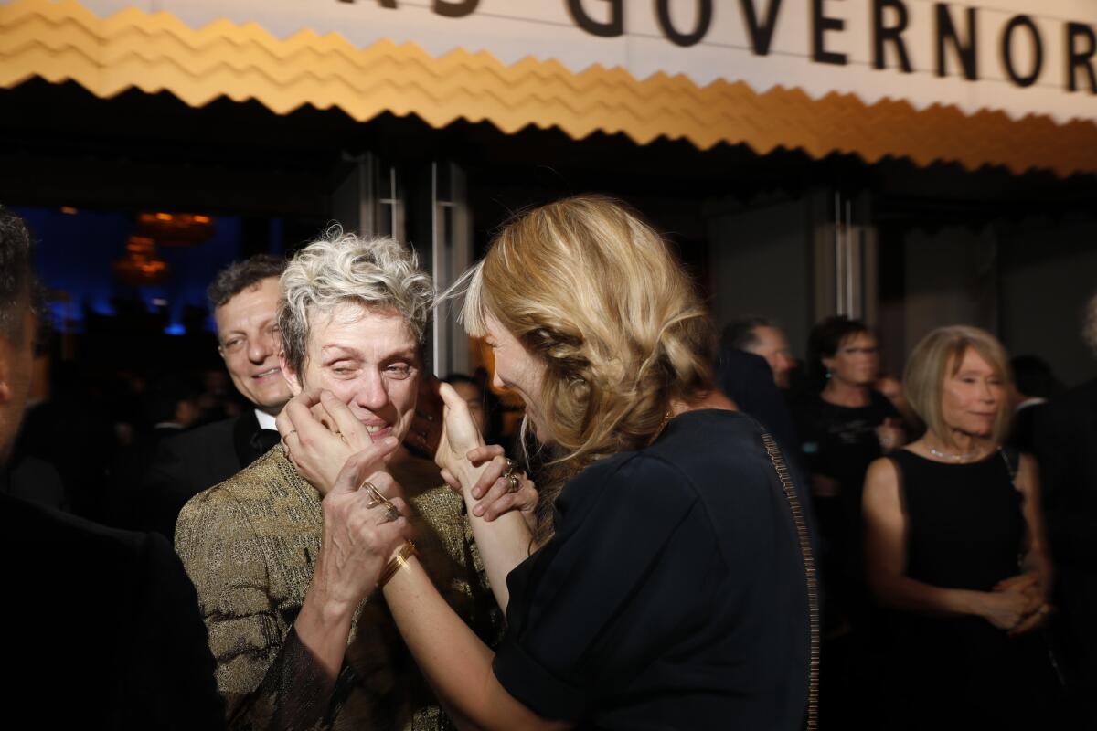 Elvira Lind consoles Frances McDormand after her Oscar goes missing at the 90th Academy Awards Governors Ball.