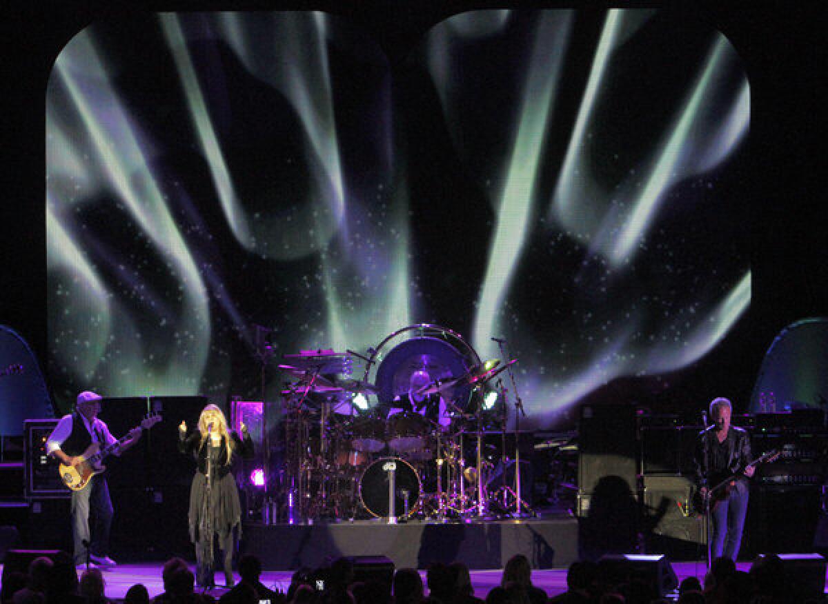 Fleetwood Mac's John McVie, left, Stevie Nicks, Mick Fleetwood and Lindsey Buckingham perform at the Hollywood Bowl on May 25, 2013. 