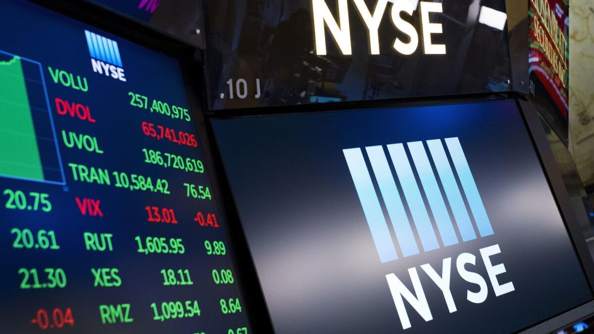 Stock screens are shown at the New York Stock Exchange in this May 10 file photo.