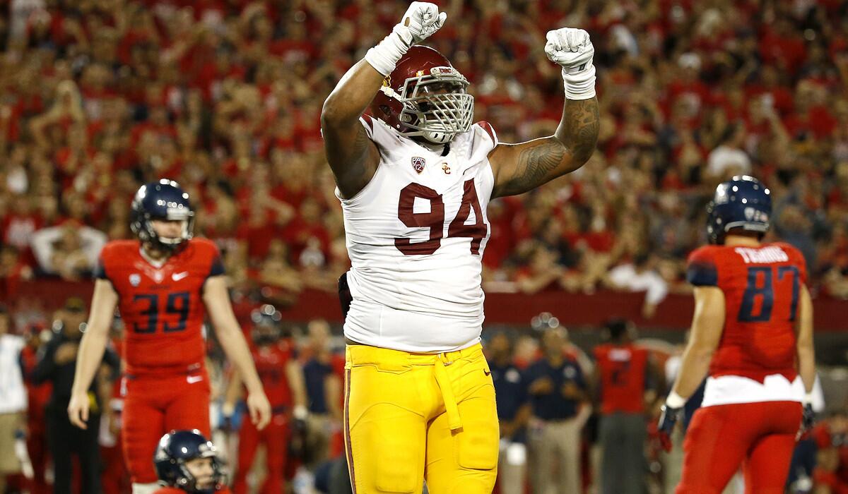 Trojans defensive end Leonard Williams reacts after Arizona failed to convert a 36-yard field-goal attempt at the end of the game Saturday.