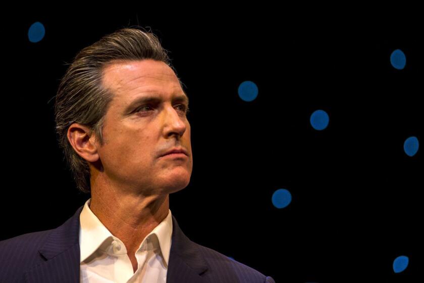 LOS ANGELES, CA - FEBRUARY 08: Governor Candidates Gavin Newsom speaks and answers questions from moderator Jane Wells during the California Gubernatorial Forum on Long Term Care at the Cocoanut Theater, Robert F. Kennedy Community School on February 08, 2018 in Los Angeles, California. (Kent Nishimura / Los Angeles Times)