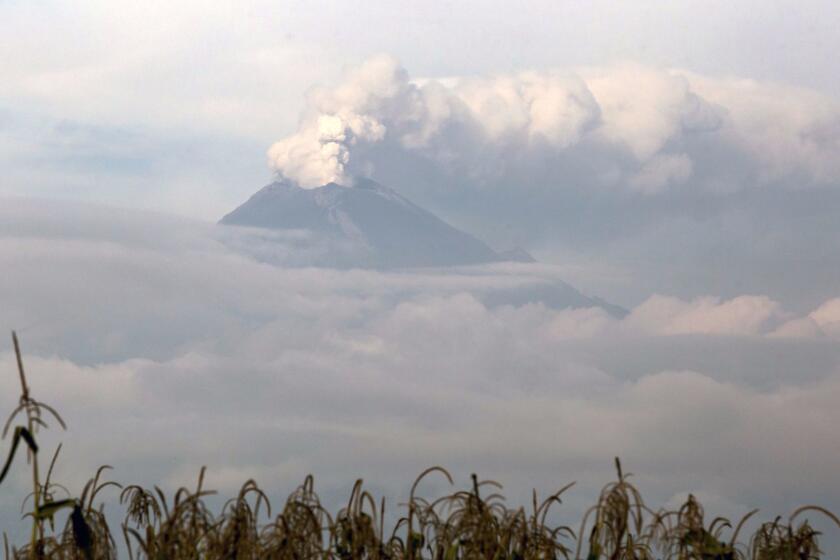 Mandatory Credit: Photo by Francisco Guasco/EPA-EFE/REX/Shutterstock (9087618a) View of the Popocatepetl volcano emitting a column of steam and gas, from San Andres Calpan, Mexico, 27 September 2017. In the last 24 hours, through the monitoring systems of the Popocatepetl volcano, 25 low intensity exhalations were identified. In addition, two volcano tectonic earthquakes were recorded, the first one yesterday at 11:25, and the second today at 02:33 local time both with a magnitude of 1.8. Volcano Popocatepetl emits 25 exhalations in the last hours, San Andres Calpan, Mexico - 27 Sep 2017 ** Usable by LA, CT and MoD ONLY **