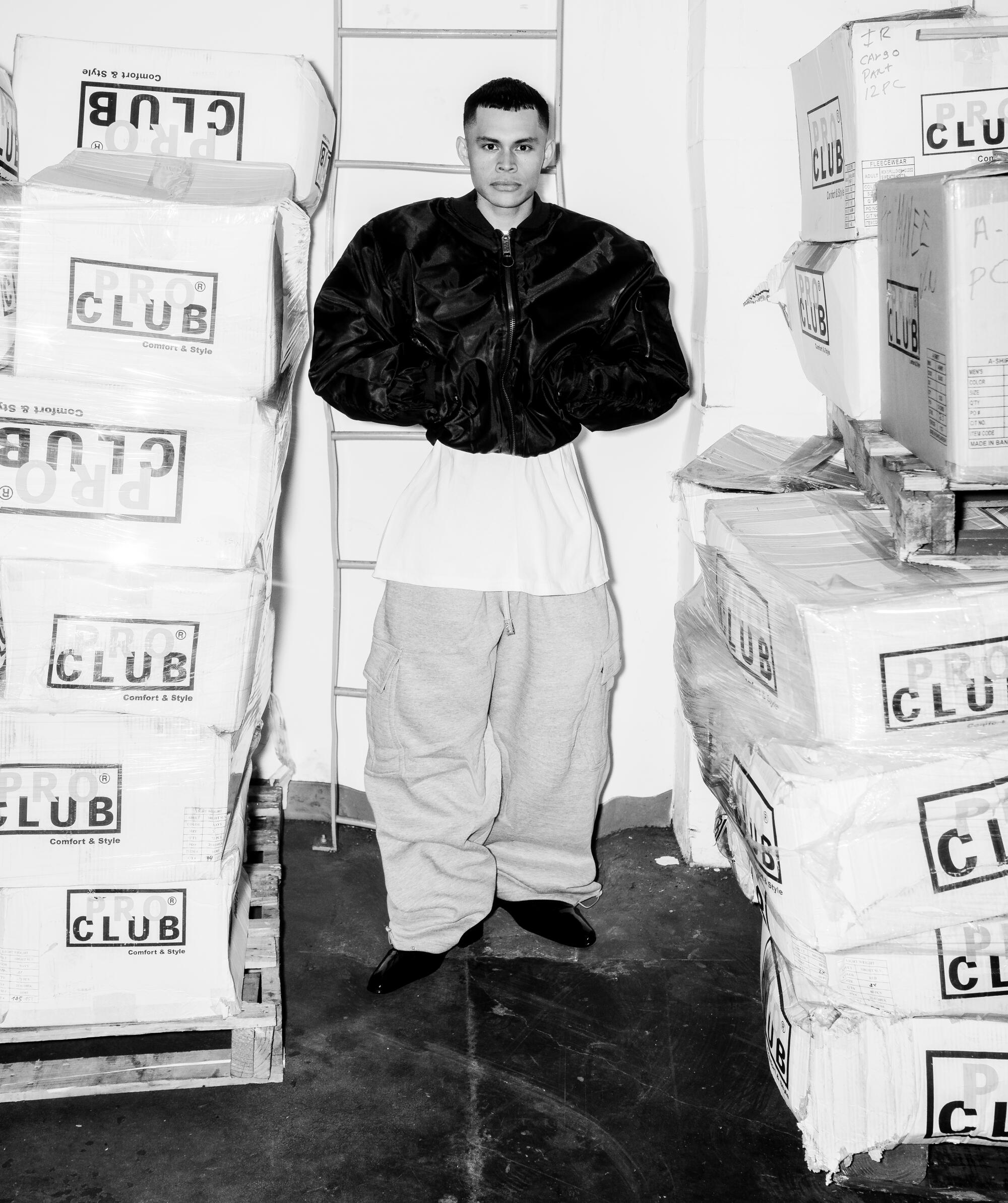 A model stands in the Pro Club warehouse.