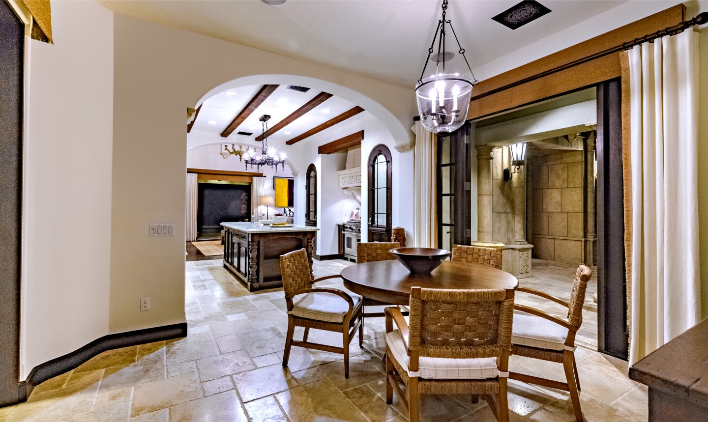 The Mediterranean villa is found in La Quinta's exclusive Madison Club community.