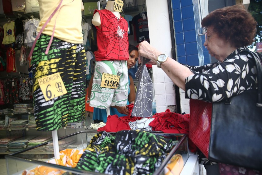 A woman shops in Rio de Janeiro in 2014.