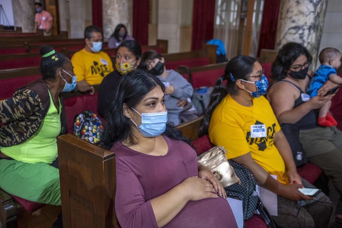 Diana Dean, middle, waits to testify about conditions at Chesapeake Apartments in South Los Angeles 